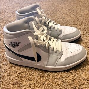 Women’s Air Jordan 1 mid light smoke grey.